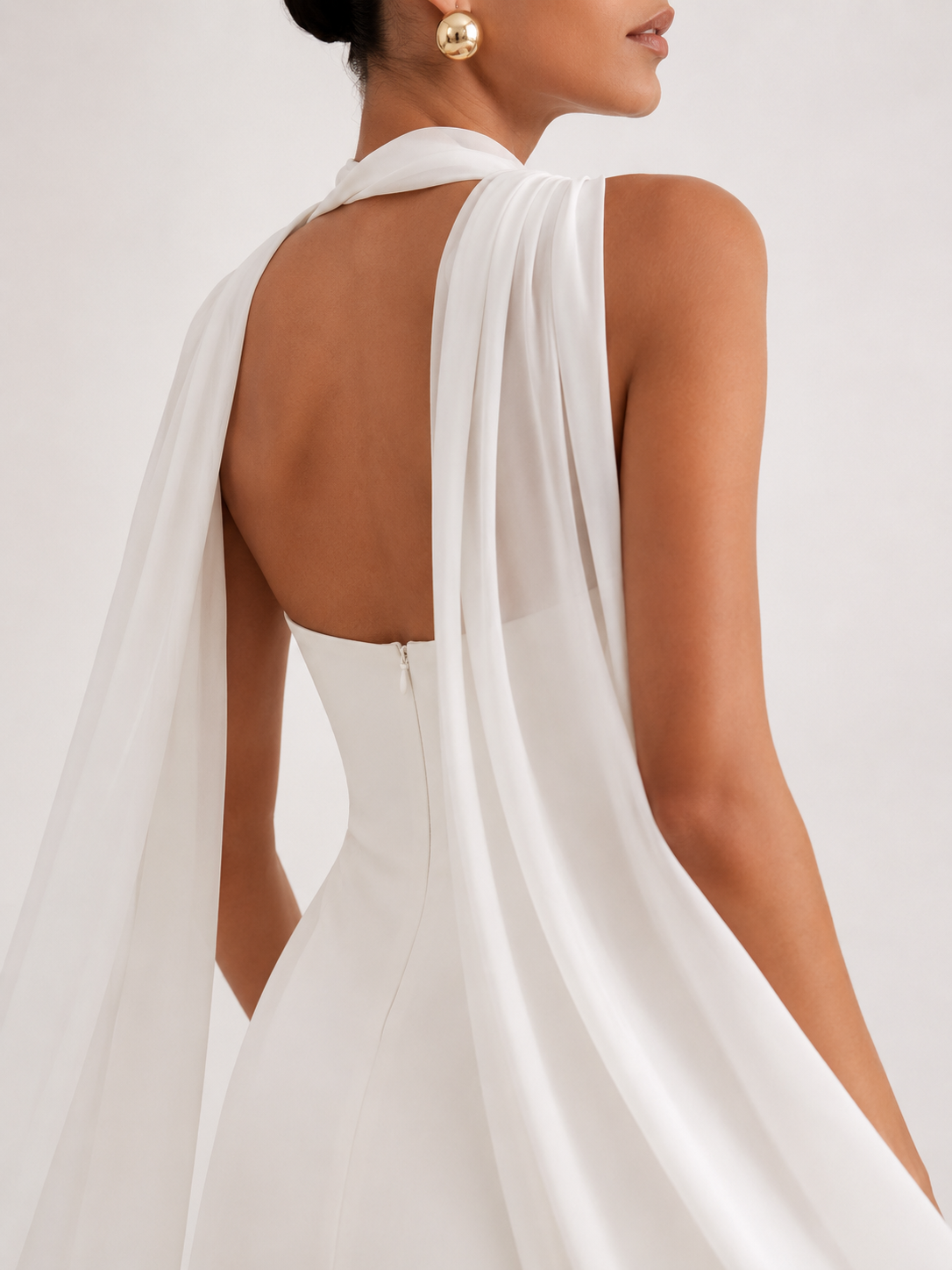 Strapless dress with asymmetric overlay