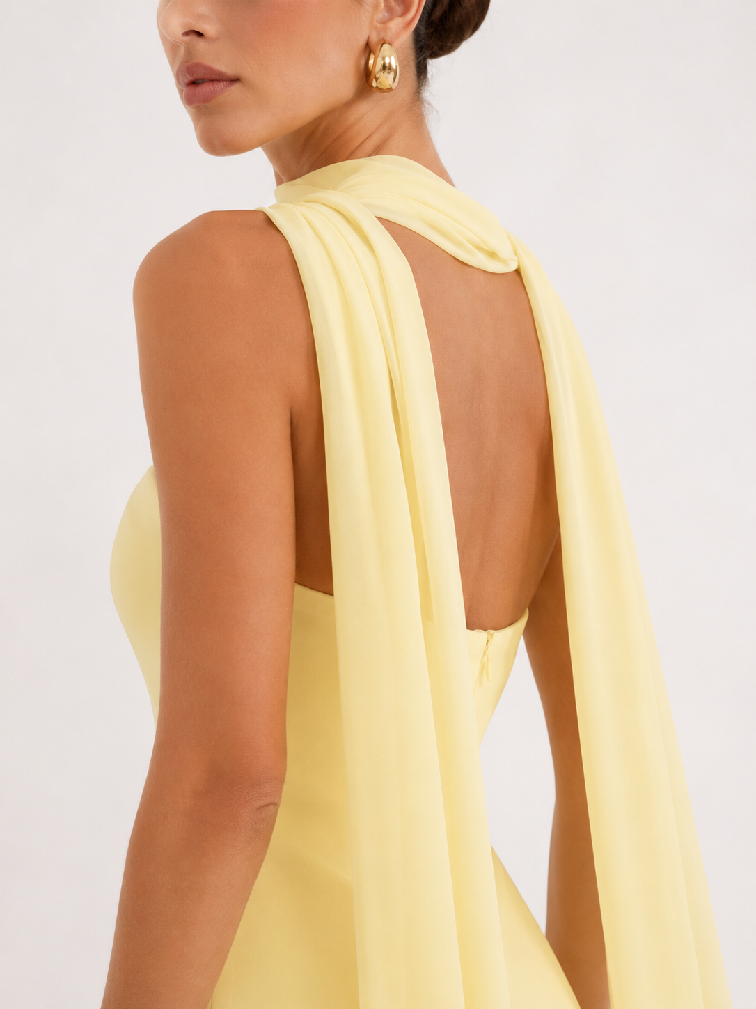 Strapless dress with asymmetric overlay