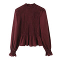 The Smocked Ruffled Blouse with Balloon Sleeves